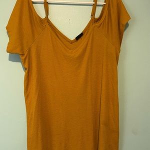 Burn orange, kind of off the shoulder high quality fabric.